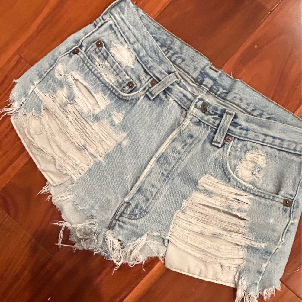 VINTAGE LEVI’S CUT OFF JEANS.